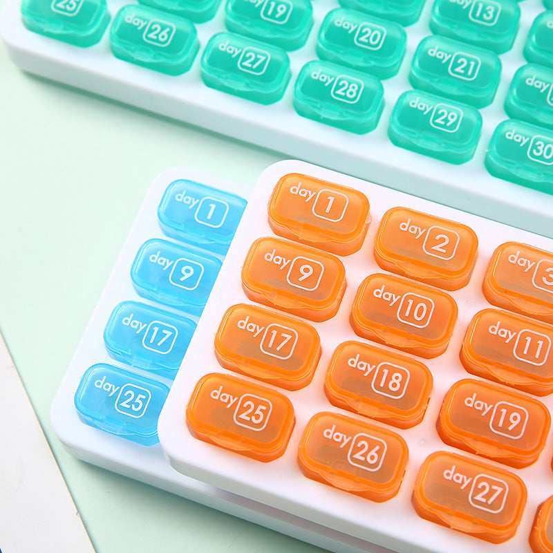 Waterproof, portable, 31-compartment detachable pill organizer