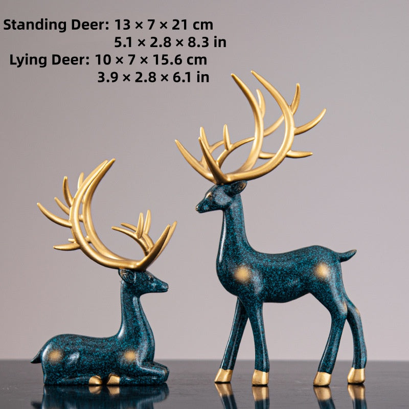 Deer statues in standing and reclining positions
