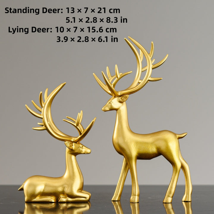 Deer statues in standing and reclining positions