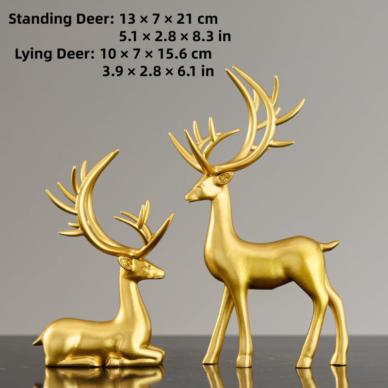 Deer statues in standing and reclining positions