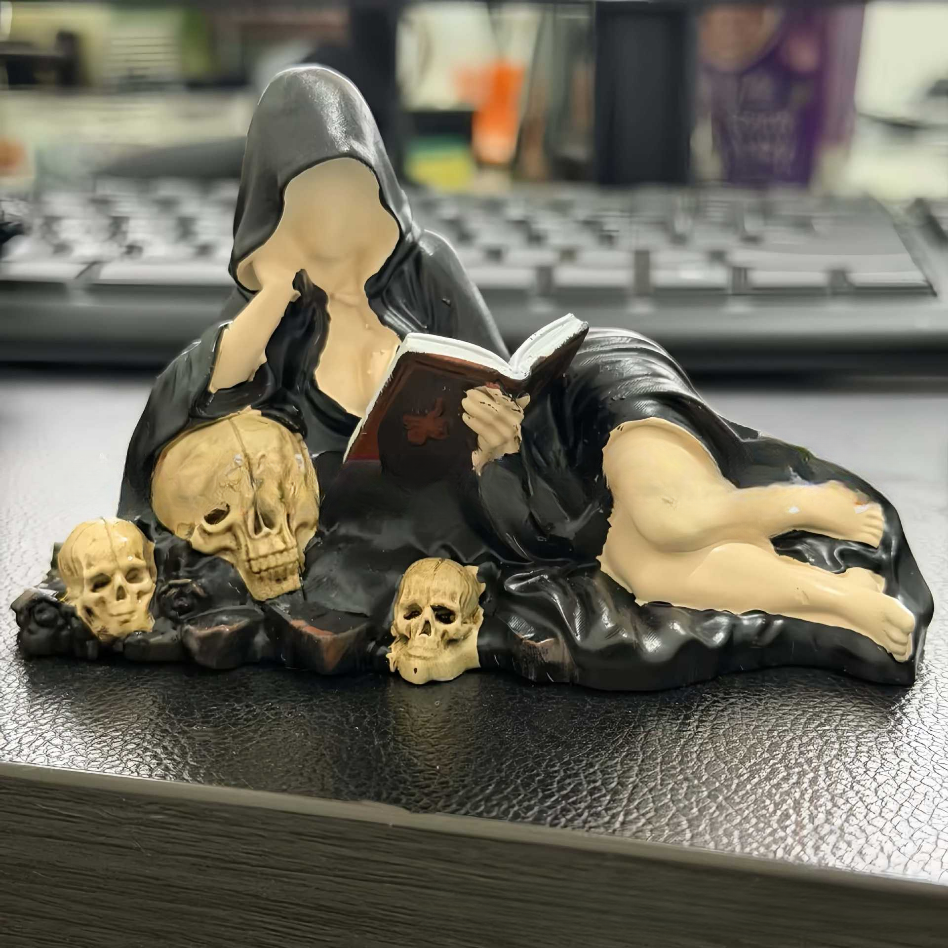 Dark-style hooded scholar statue ornament