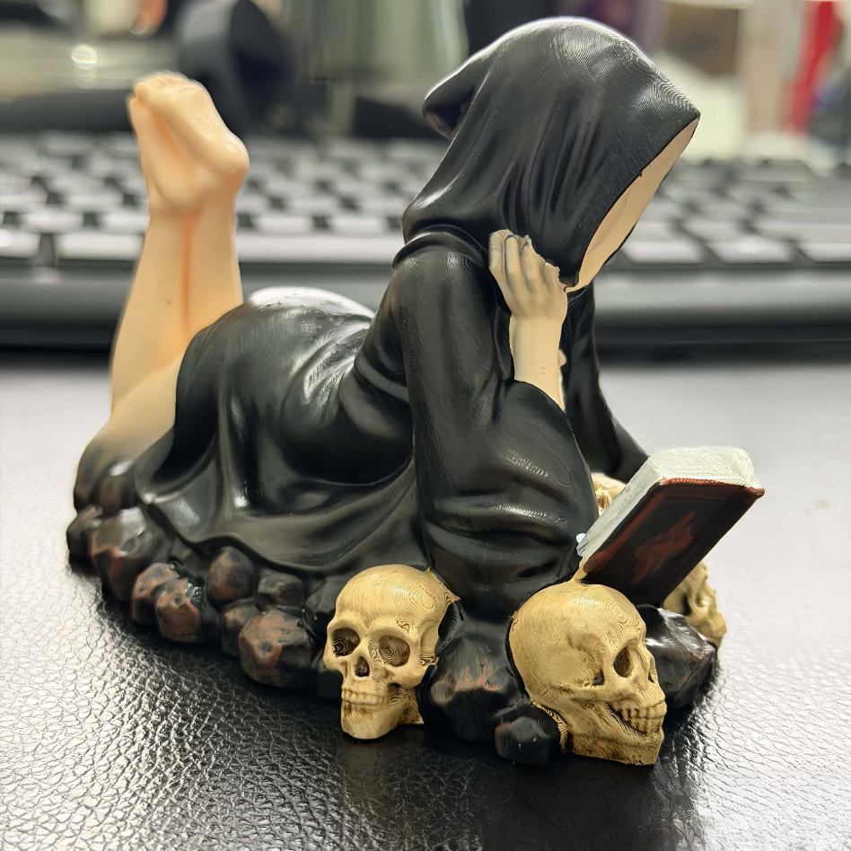 Dark-style hooded scholar statue ornament