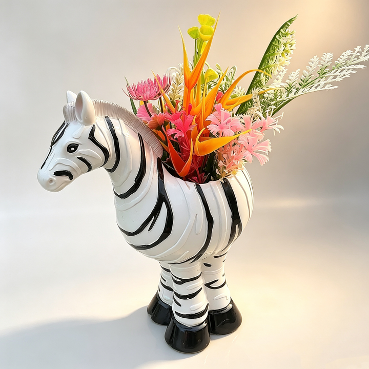 Footed planter with zebra-stripe pattern