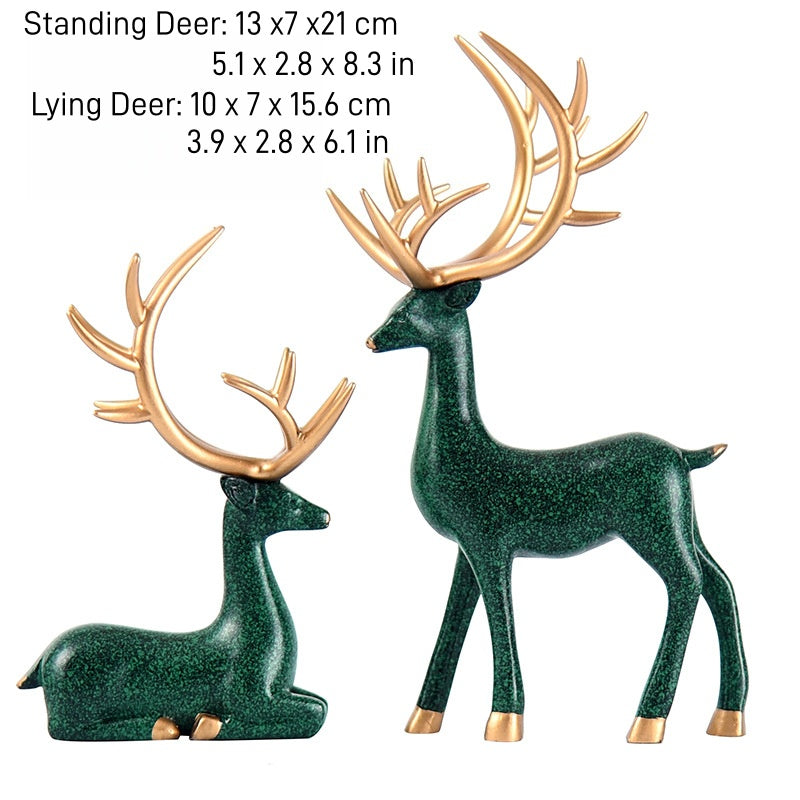 Deer statues in standing and reclining positions