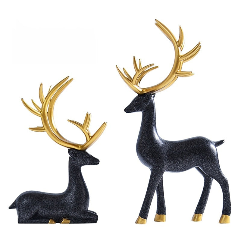Deer statues in standing and reclining positions