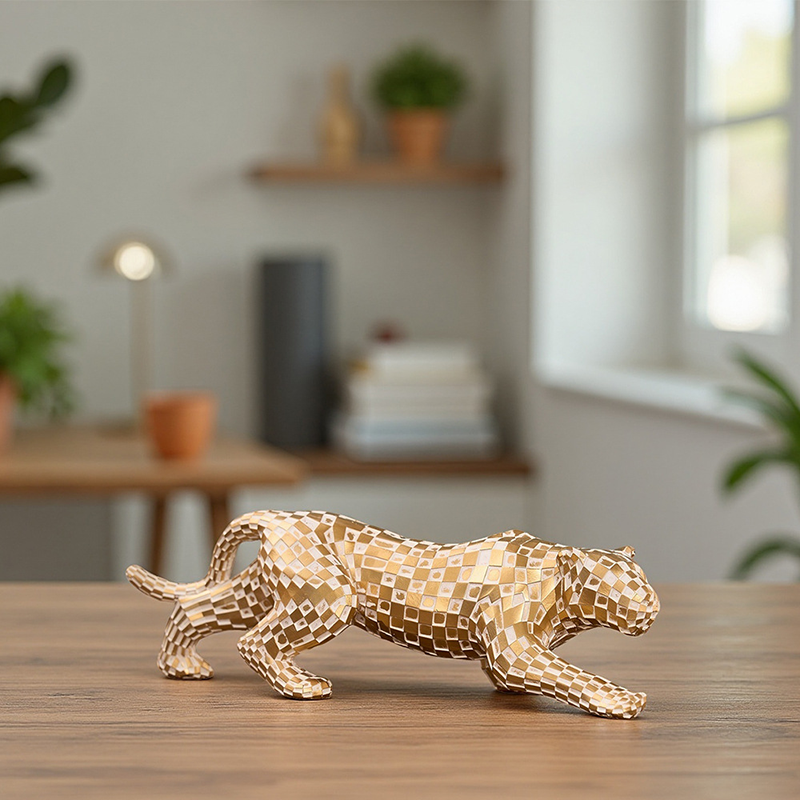 Gold-colored resin leopard ornament
