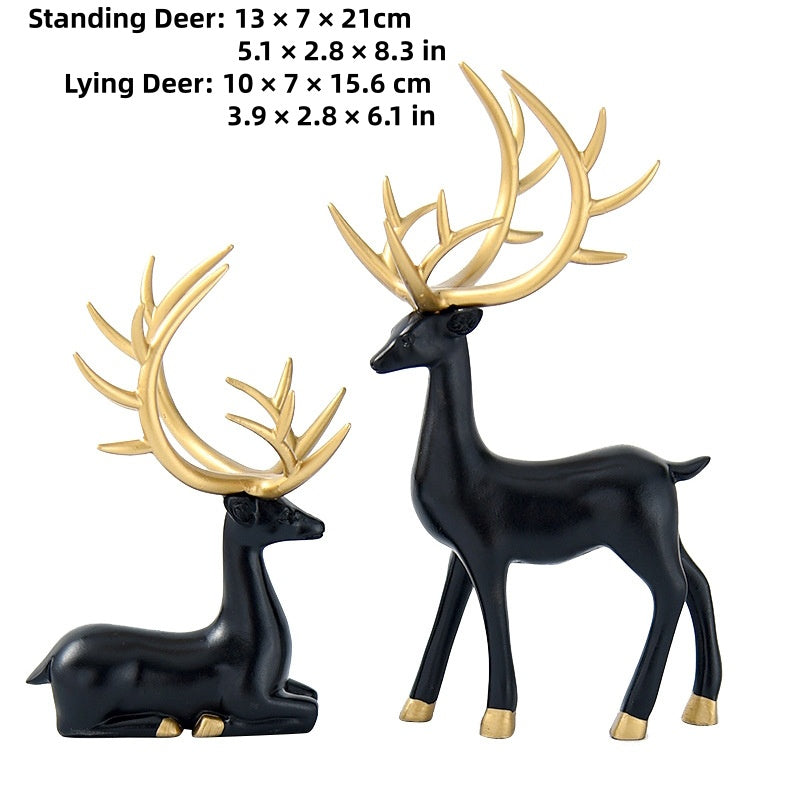 Deer statues in standing and reclining positions