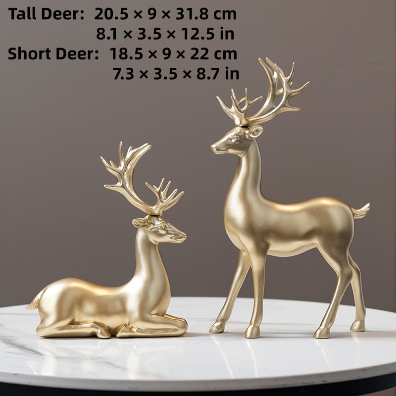 Deer statues in standing and reclining positions