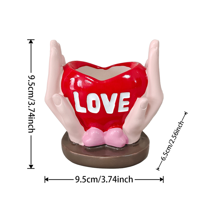"Love" — Holding a Heart-Shaped Candle Holder
