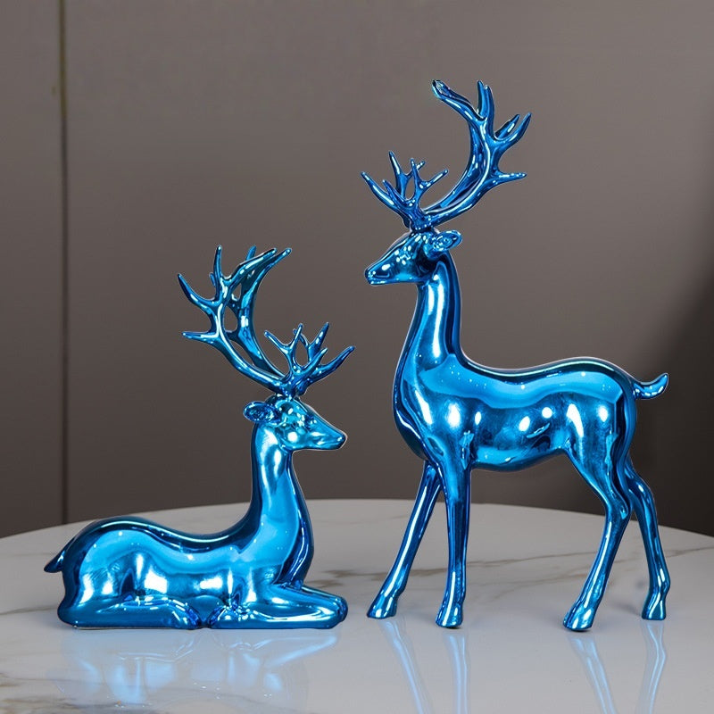 Deer statues in standing and reclining positions