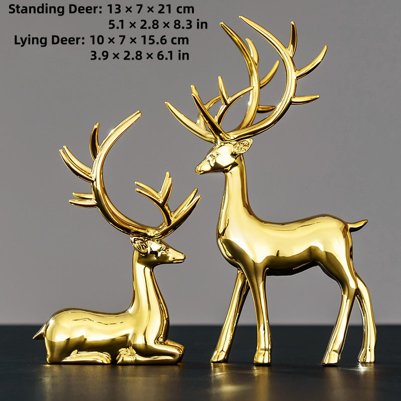 Deer statues in standing and reclining positions