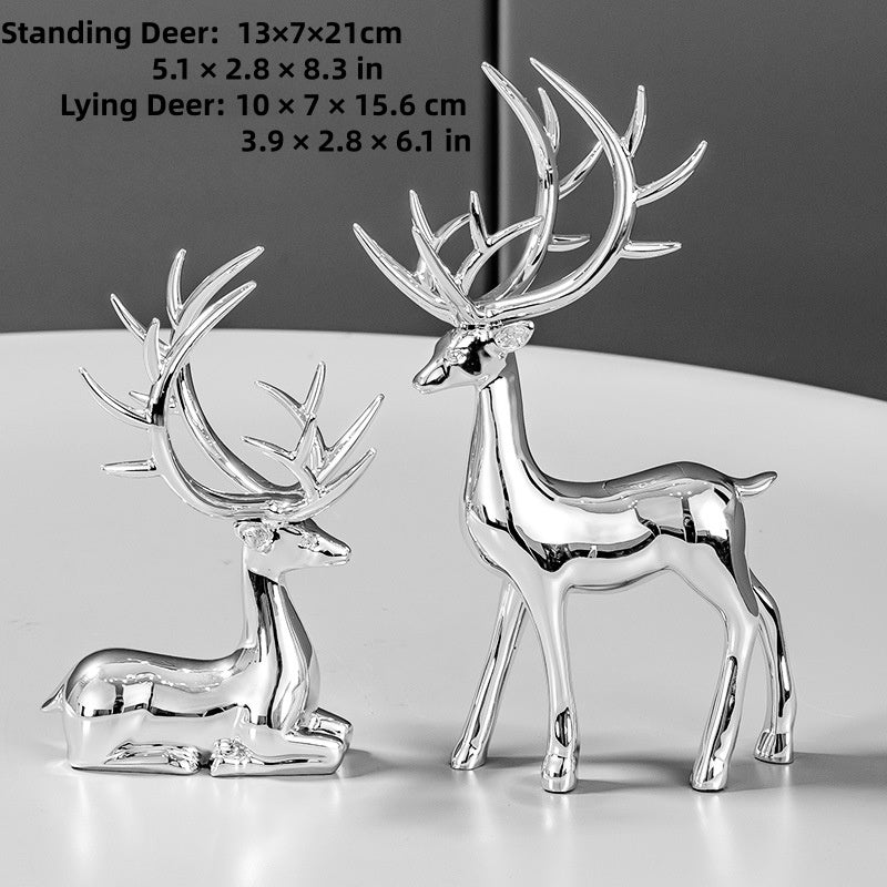 Deer statues in standing and reclining positions