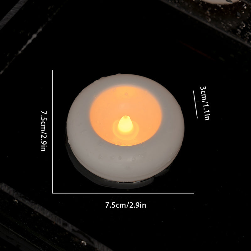 Sensor-activated LED floating candle light