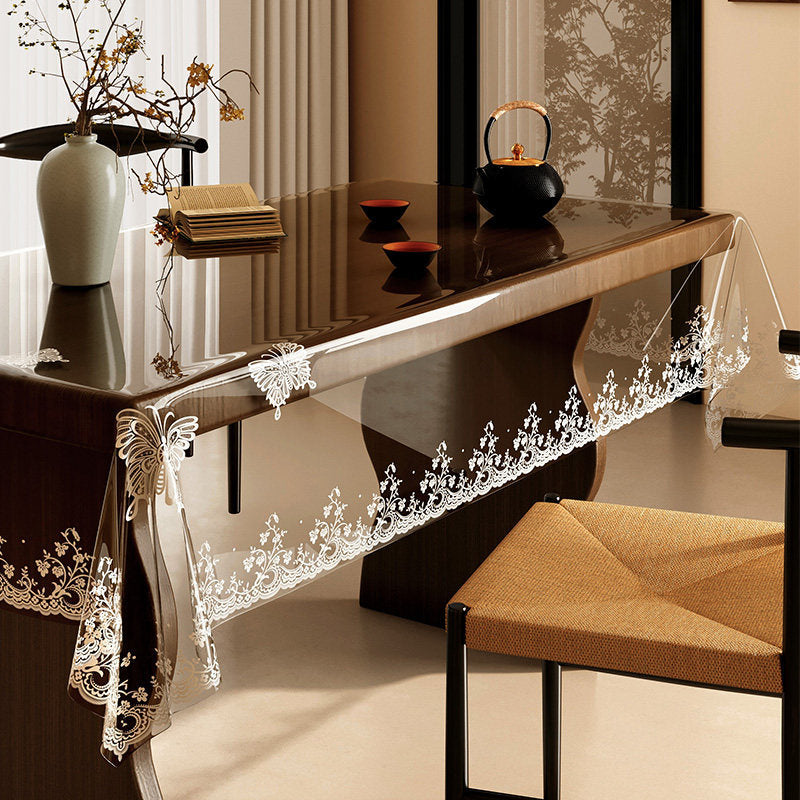 All-new "soft glass" transparent tablecloth—understated luxury.