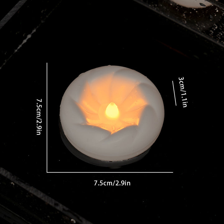 Sensor-activated LED floating candle light