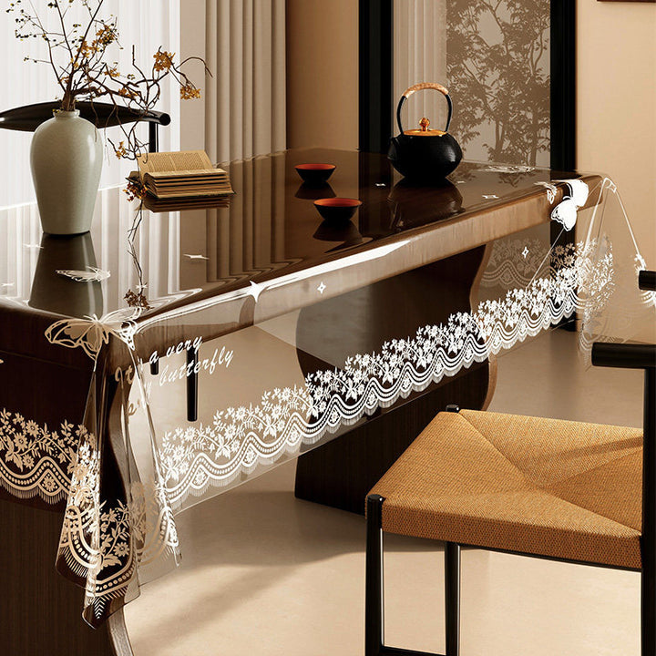 All-new "soft glass" transparent tablecloth—understated luxury.