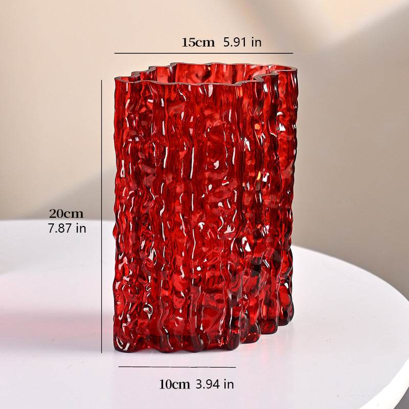 A thick, crystal-clear crystal glass vase.