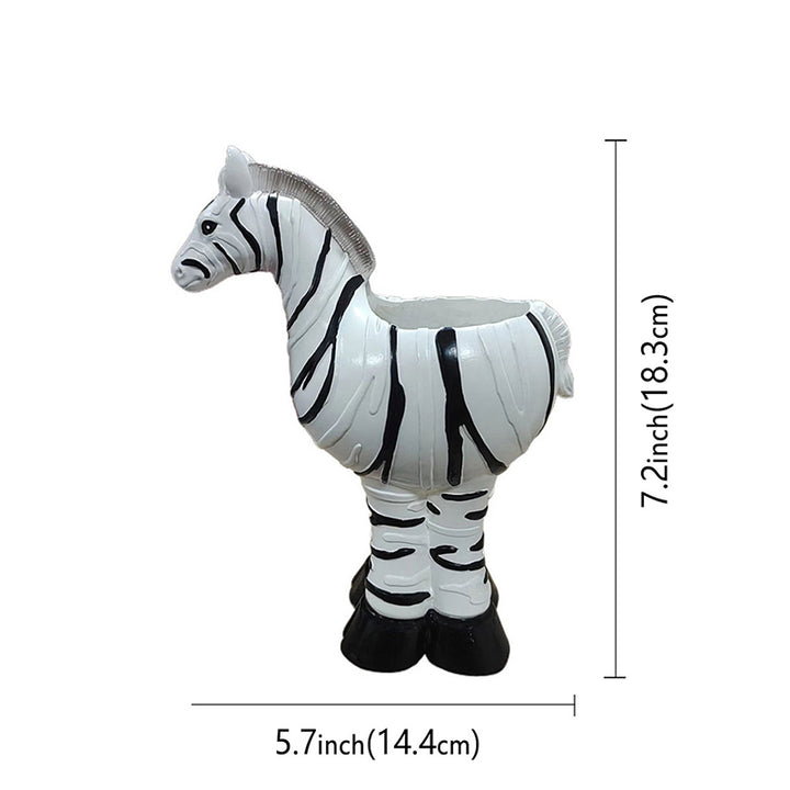 Footed planter with zebra-stripe pattern