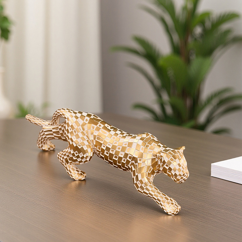 Gold-colored resin leopard ornament