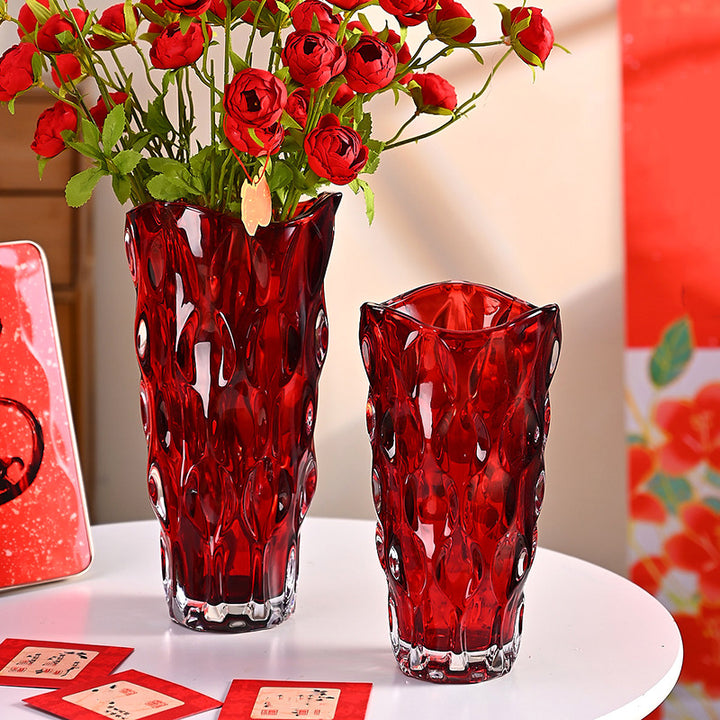 A thick, crystal-clear crystal glass vase.