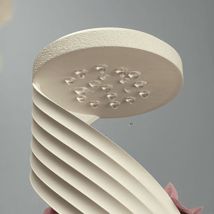 3D-Printed Rotating Rain-Effect Vase