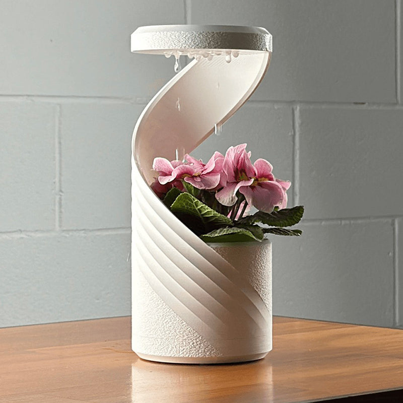 3D-Printed Rotating Rain-Effect Vase