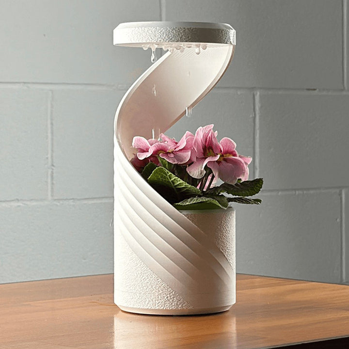 3D-Printed Rotating Rain-Effect Vase