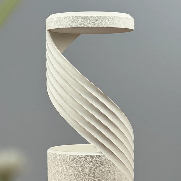 3D-Printed Rotating Rain-Effect Vase